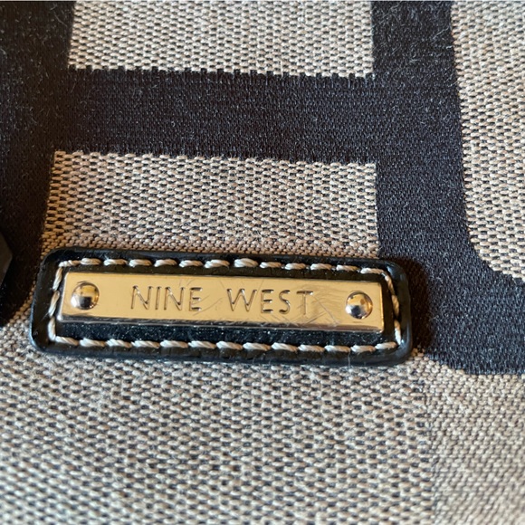 Nine West Crossbody purse in a brown/tan abstract pattern. - Picture 2 of 9